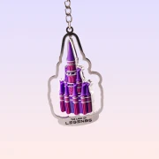 The Land of Legends Spinning Chateau Keychain - Purple